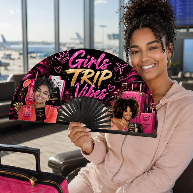 Girls Trip Vibes personalized clack fan with two custom photos, hot-pink luggage, passports and travel decorations.